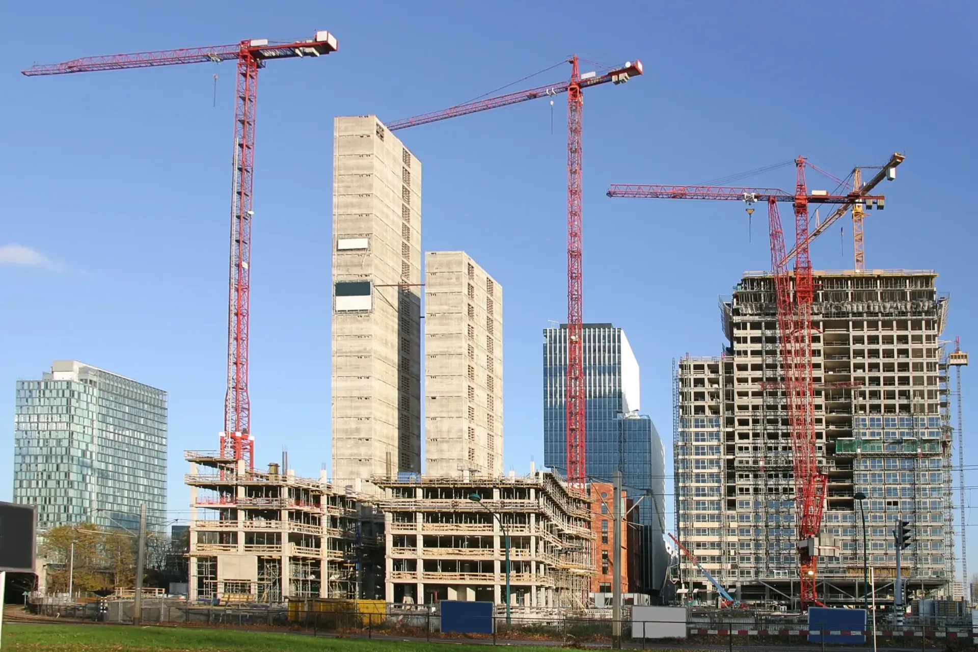 Tower cranes above buildings under construction