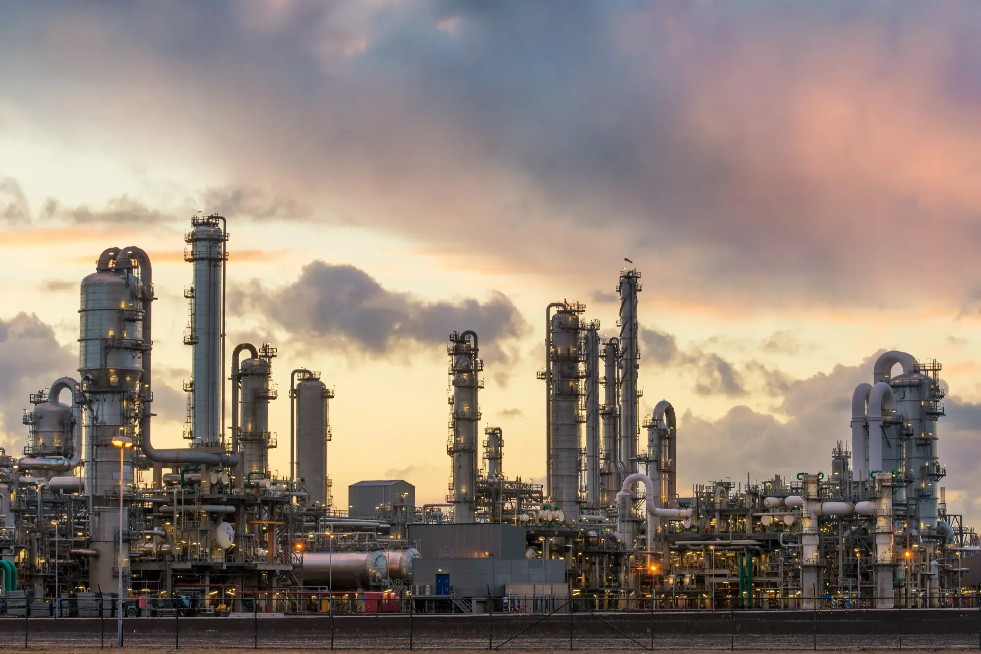 Industrial processing towers and pipework across a large operating facility